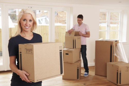 Team preparing items safely for a van move