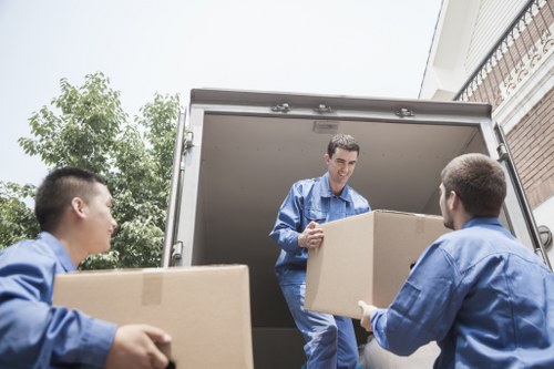 Local movers handling business relocation logistics in Bow