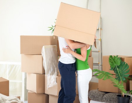 Loading furniture and boxes into a removal van for a Bow property