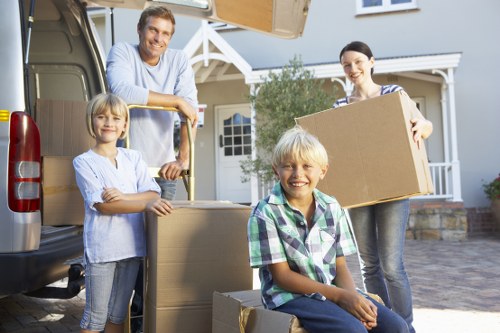 Local removals team handling furniture near Bow streets
