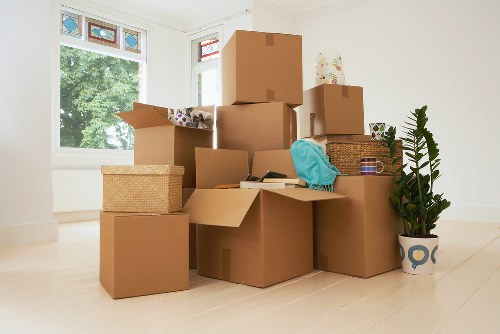 Furniture and boxes ready for removals near Bow homes