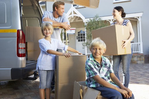 Packed boxes and moving supplies ready for a local removal service
